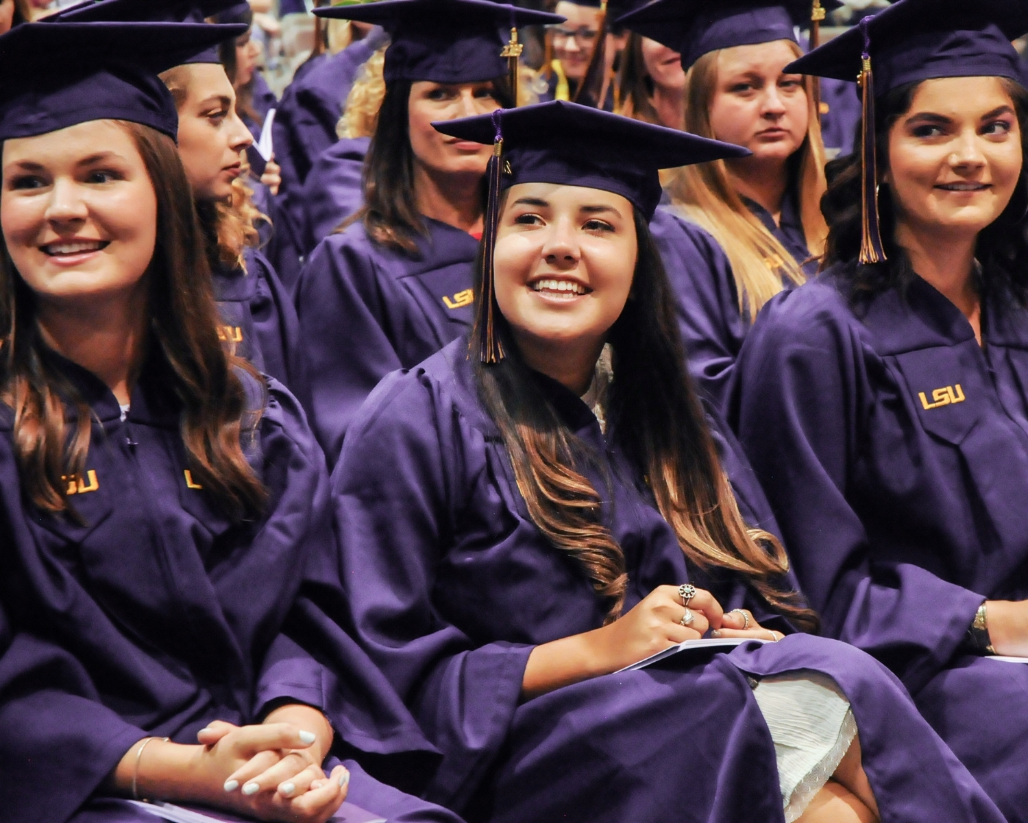 Students in graduation robes and hat