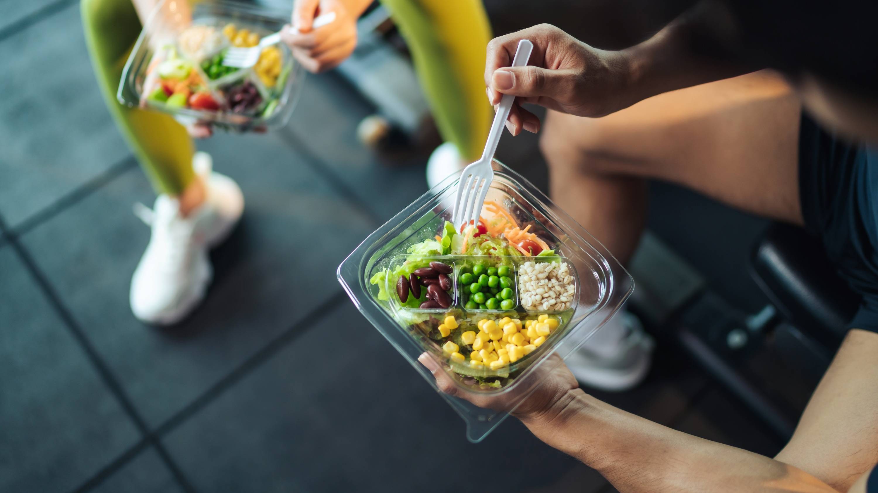 person eats veggie bowl