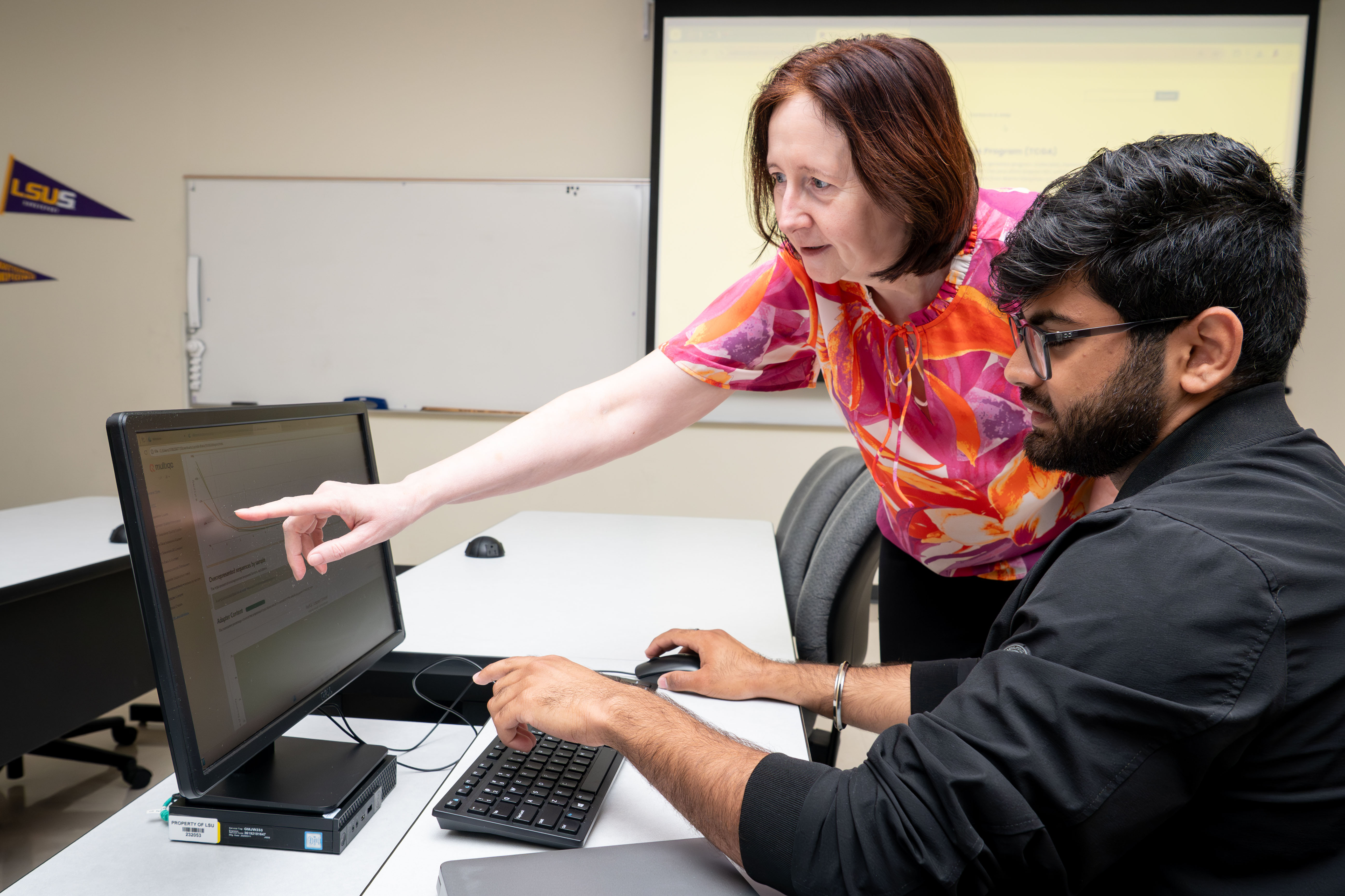 Professor and student work on quality control on LTP platform