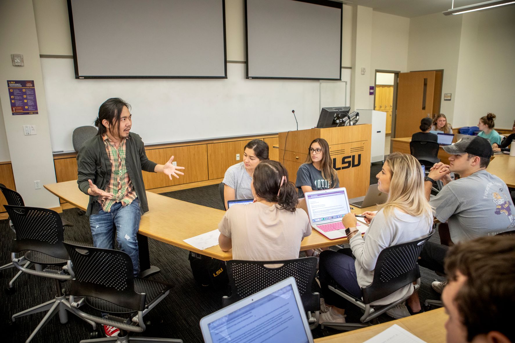 Professor Andrew Kuo leads students in a conversation.