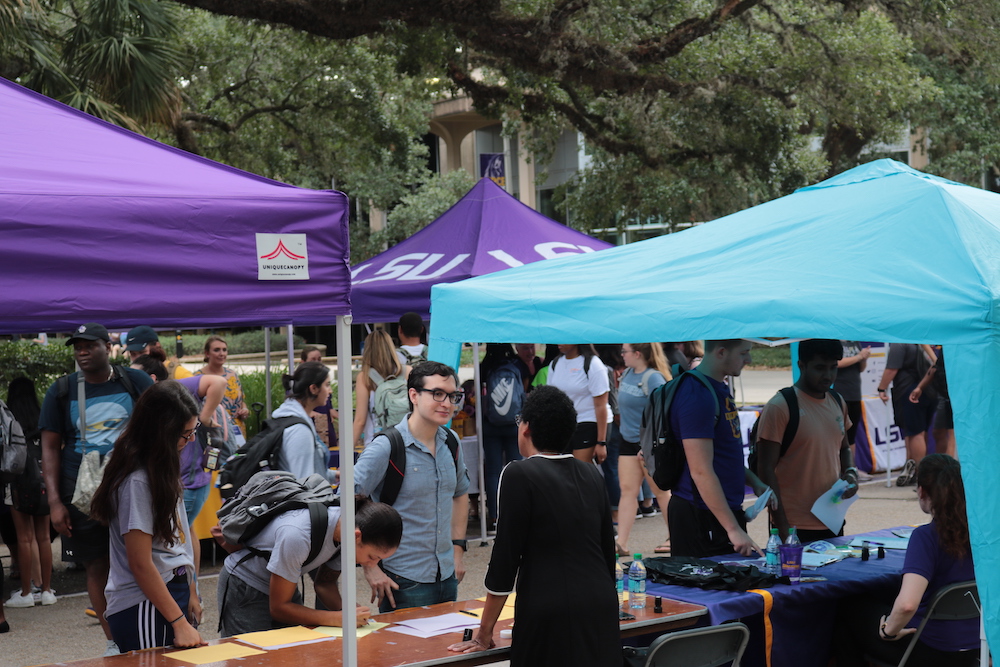 Decorative: People standing at the Academic Kick-Off Tents
