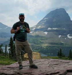 Frank Rinkevich standing on mountain top