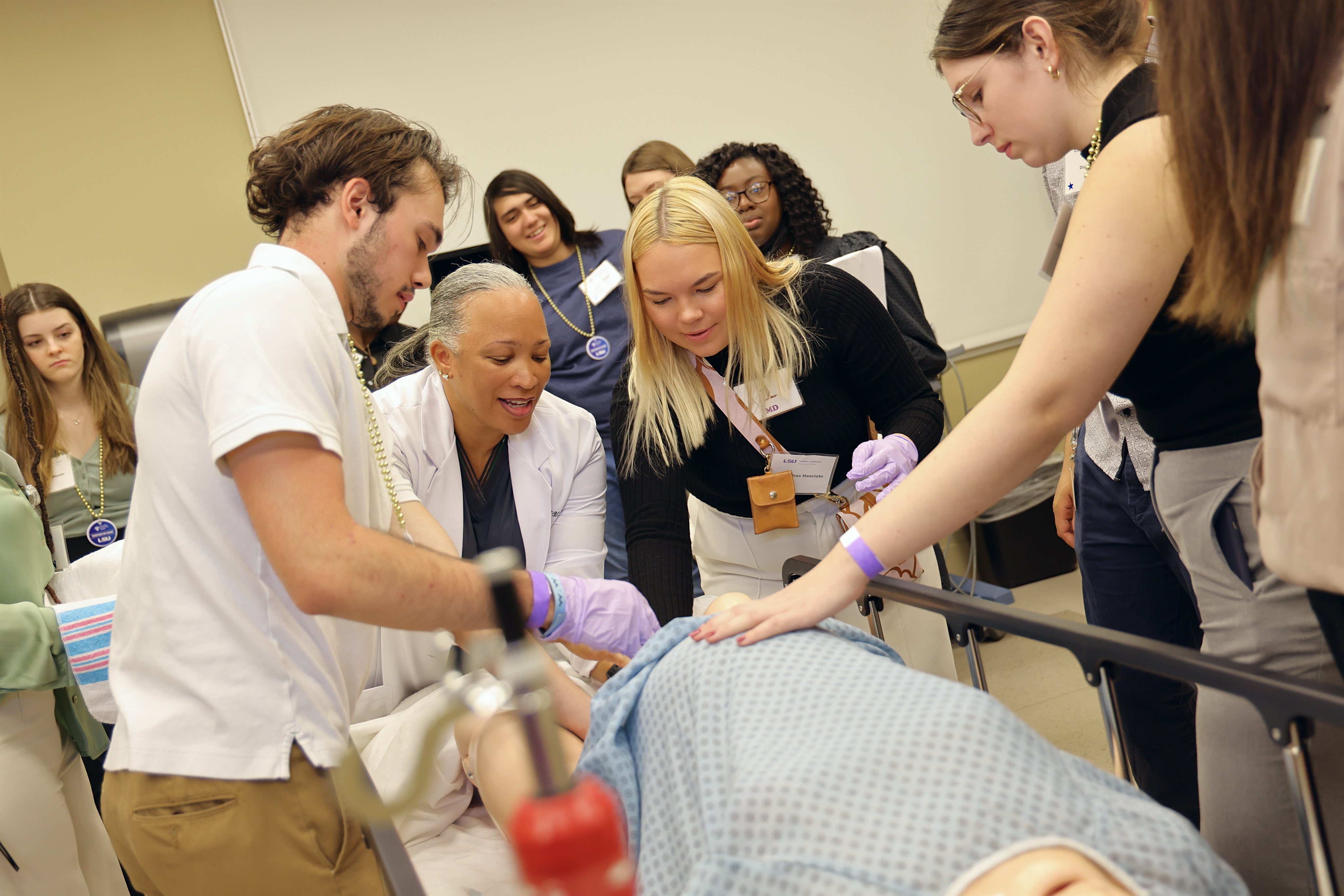 student participating in a medical simulation