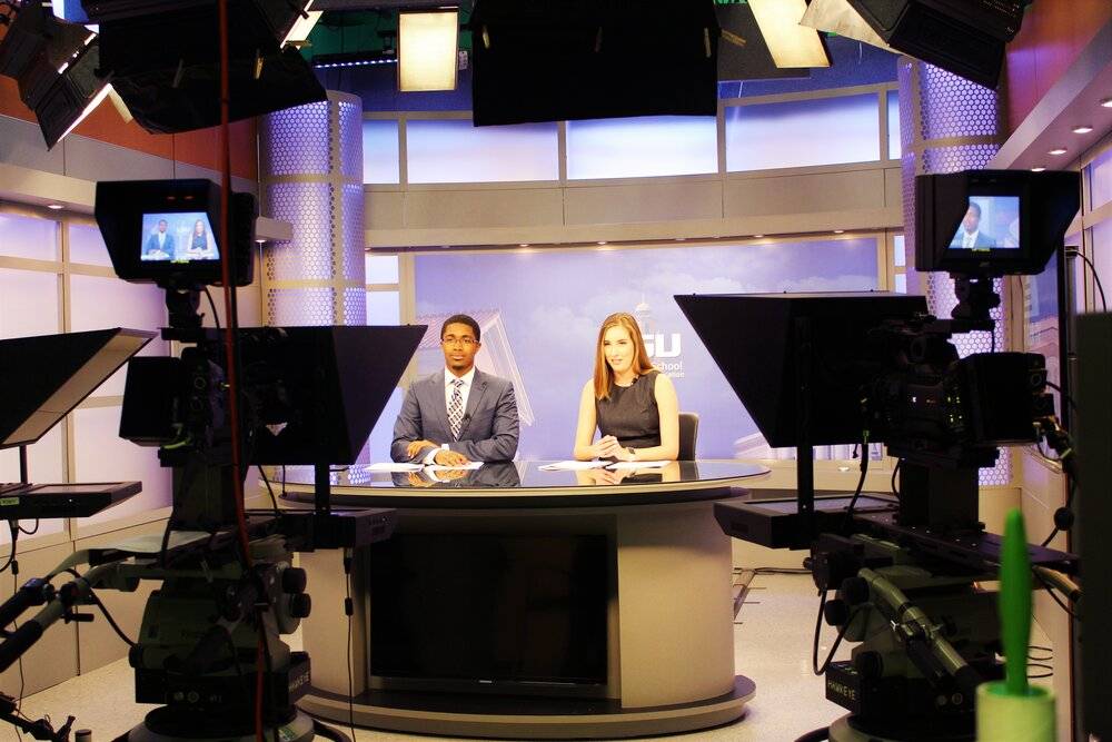 Journalism students on TigerTV set