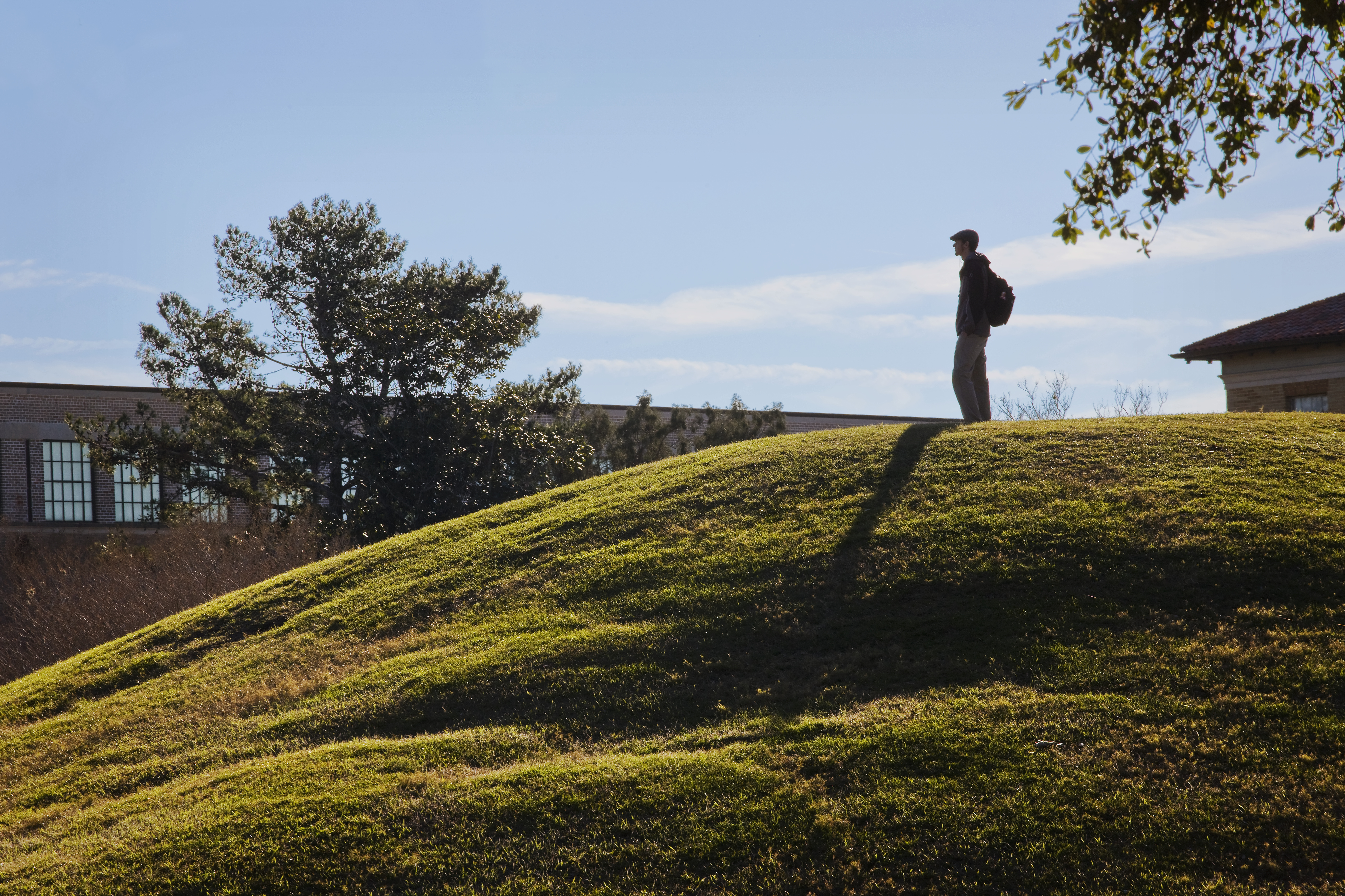 A man stands on one of the Mounds in this undated file photo.