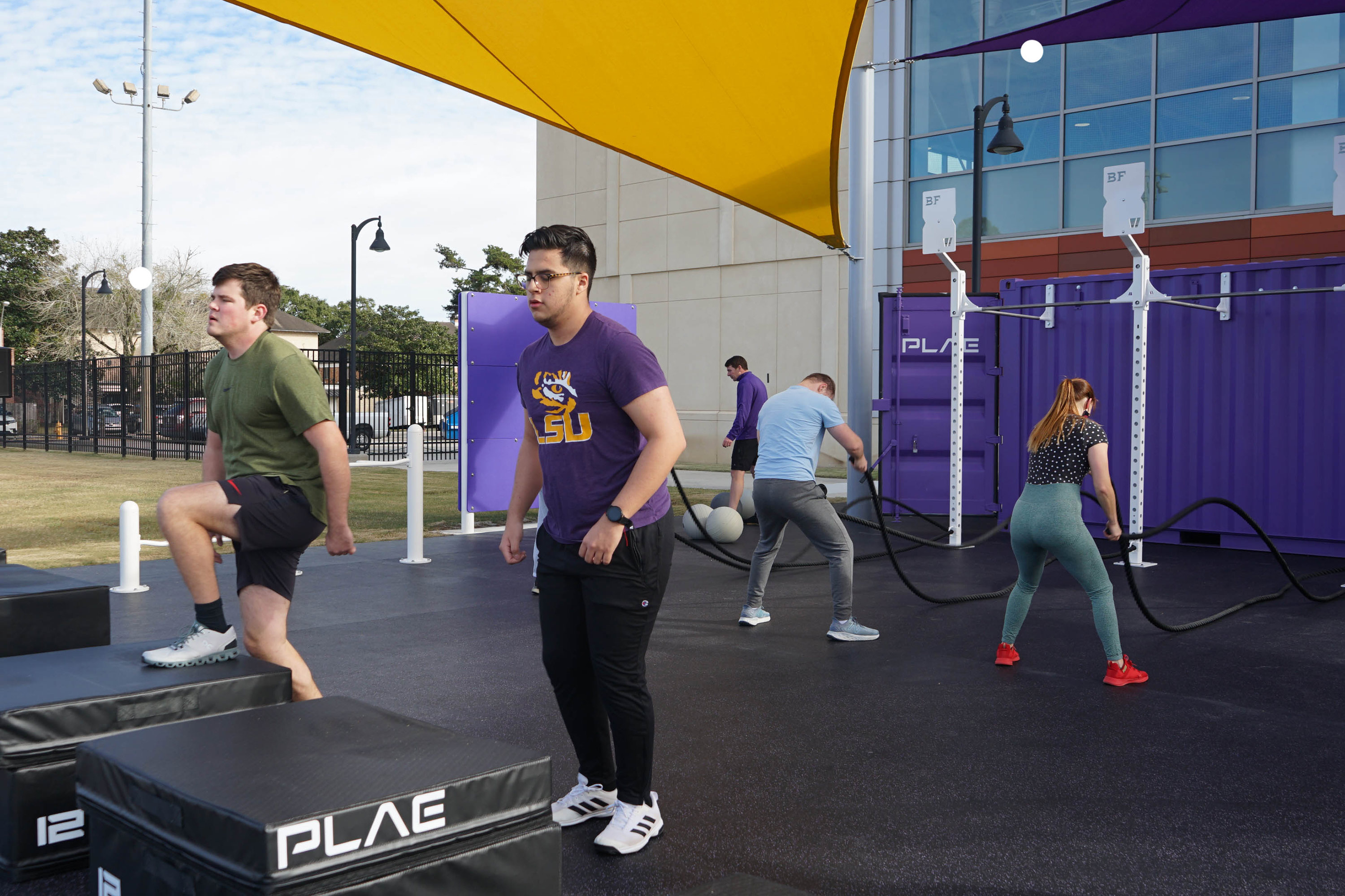 patrons getting a workout in in our outdoor fitness area