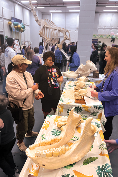visitors with LSU Vet Med student in the anatomy lab